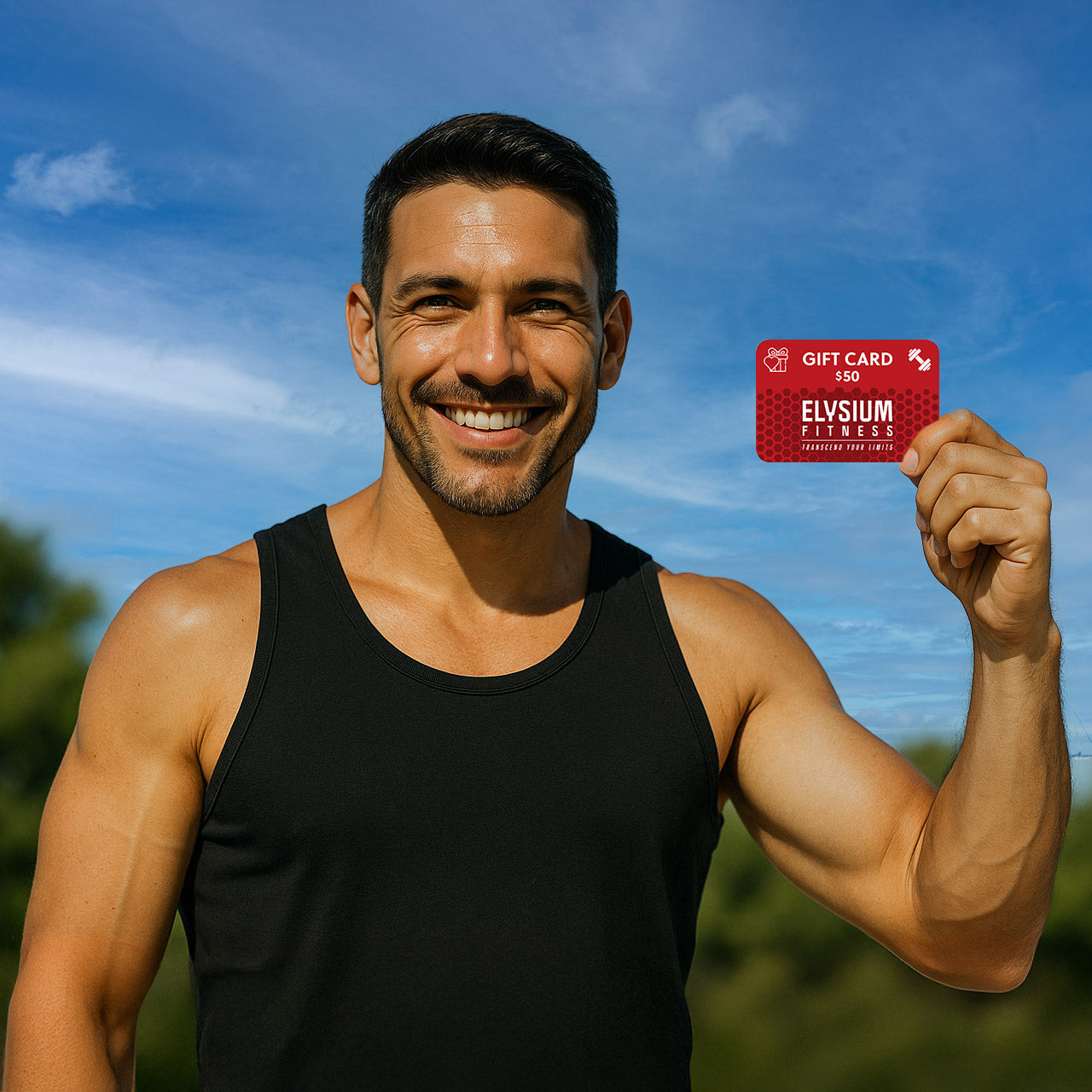 Athletic man holding a $50 Elvsium Fitness gift card against a blue sky